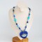 Collier cœur avec œil bleu